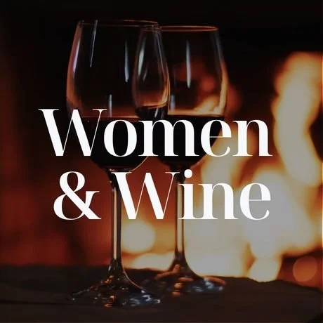 Wine glasses by fireplace cozy restaurant scene