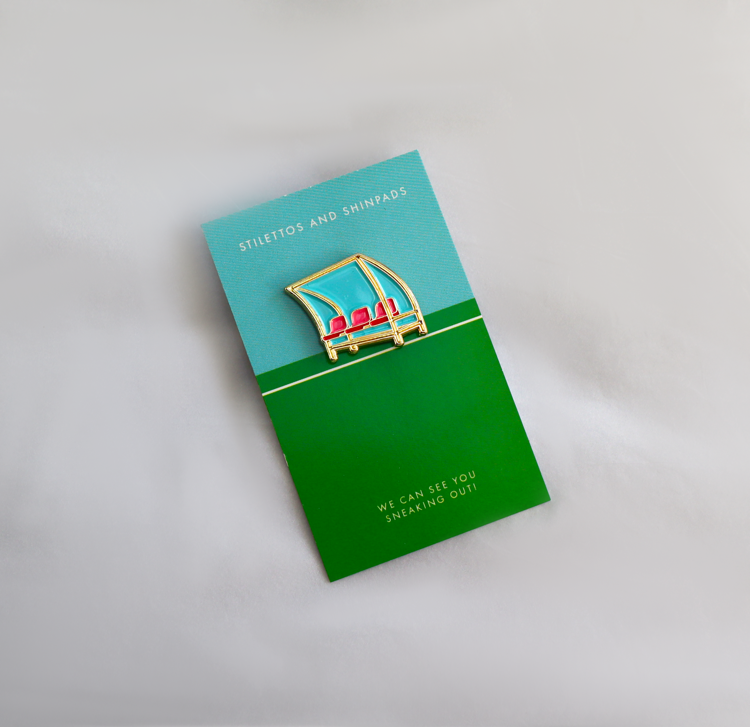 enamel pin with backer.png