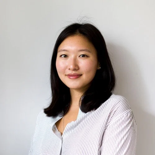 Long-haired person in striped shirt, embodying StyleTheory against white | Ctrl Alt Career