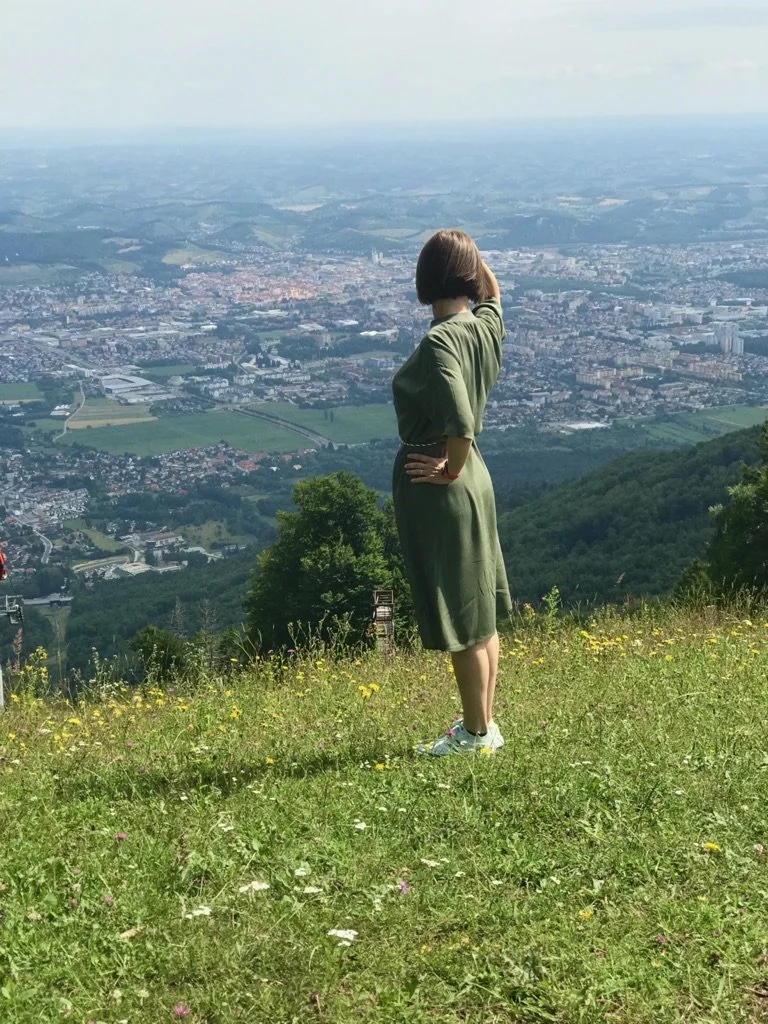 Diana standing at Bellevue on Pohorje, overlooking Maribor, Slovenia