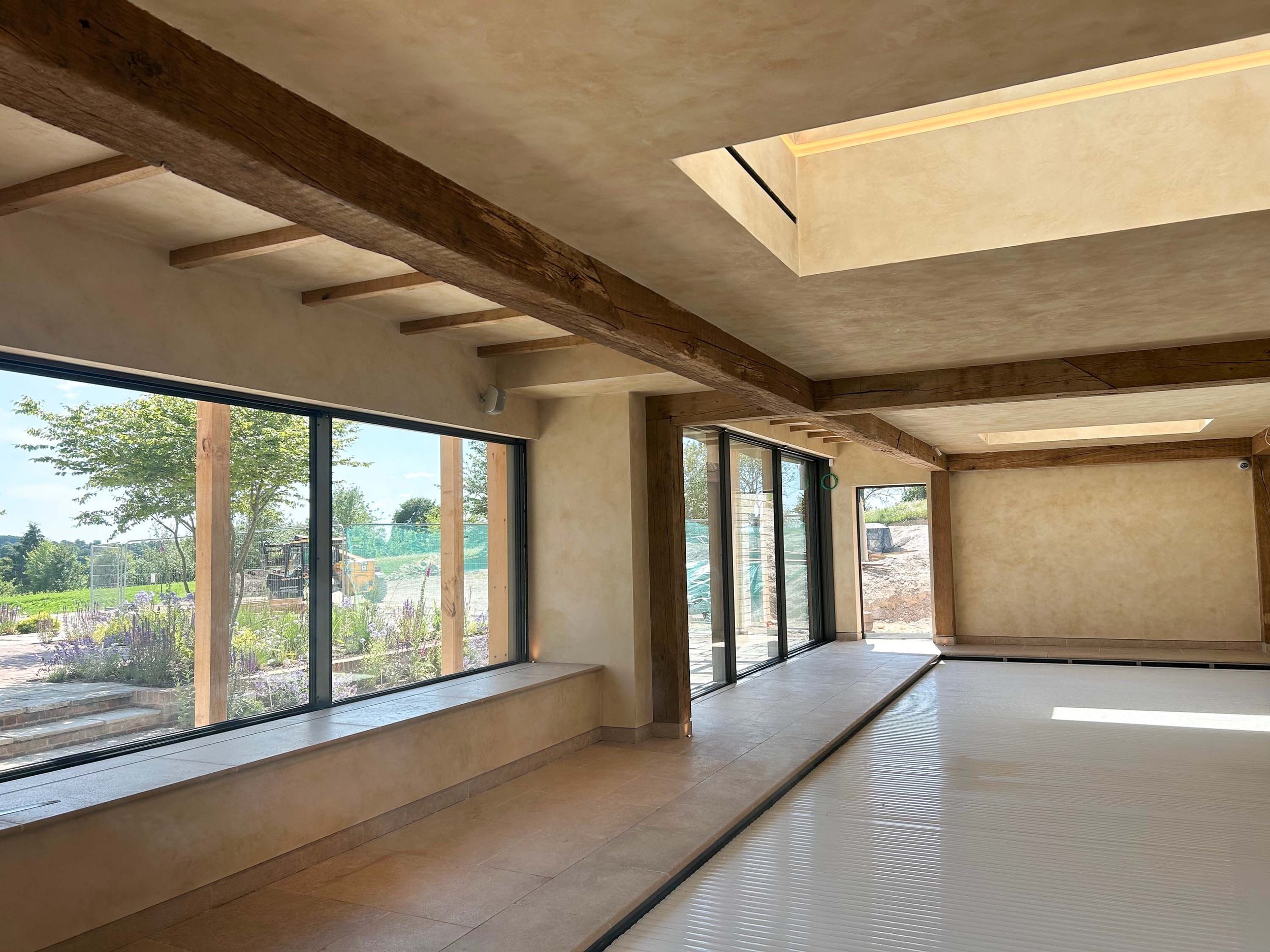 An image of an oak frame swimming pool.