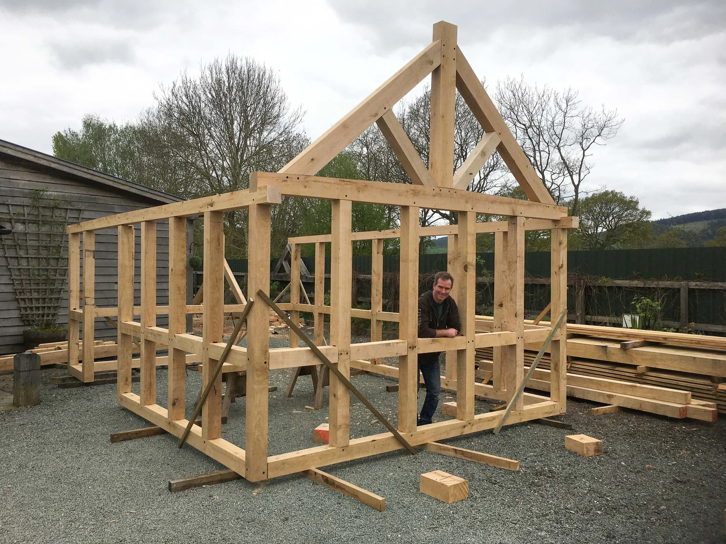 An image of assembling oak beams for an oak frame summer housek