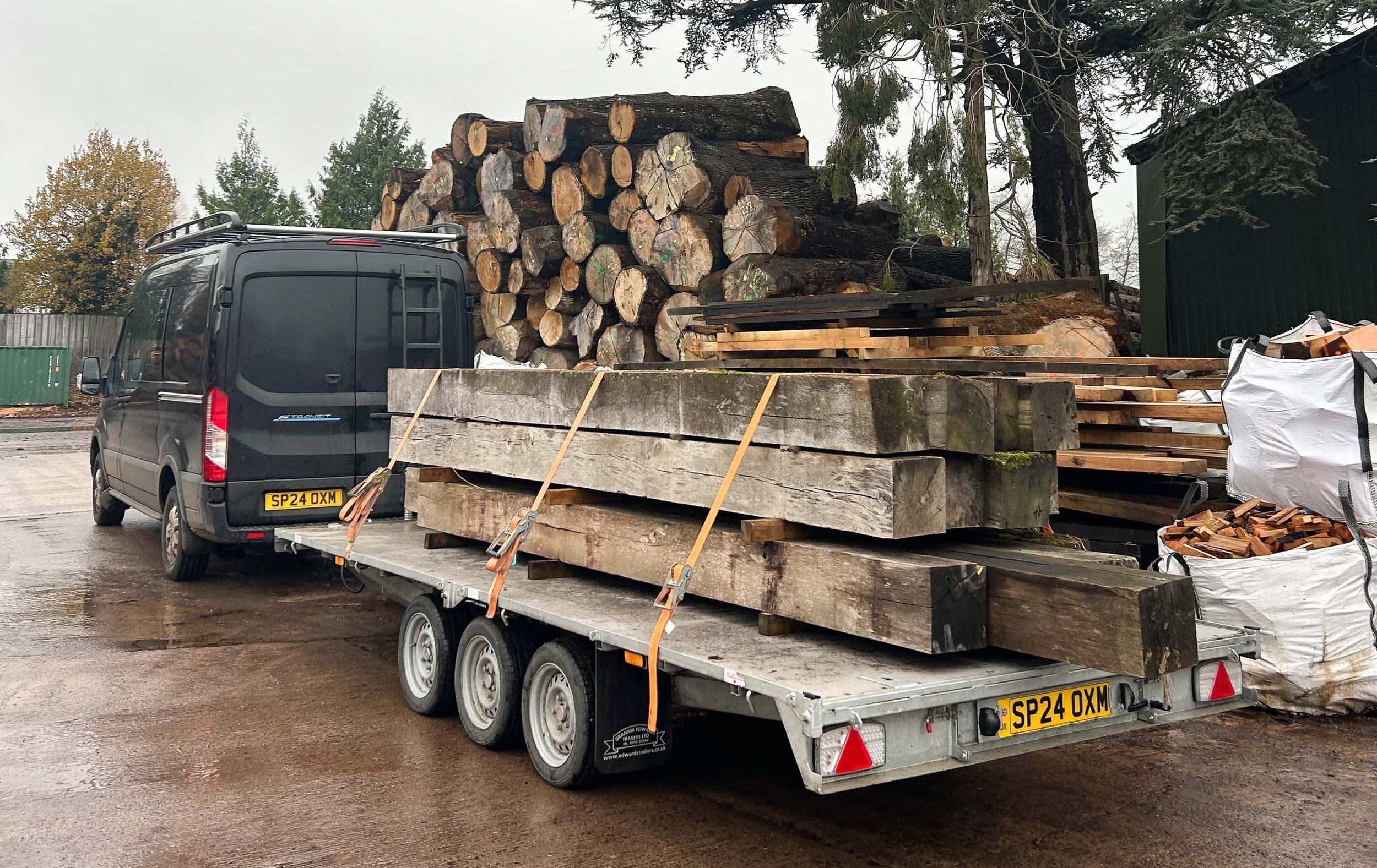 An image of a van collecting oak beams