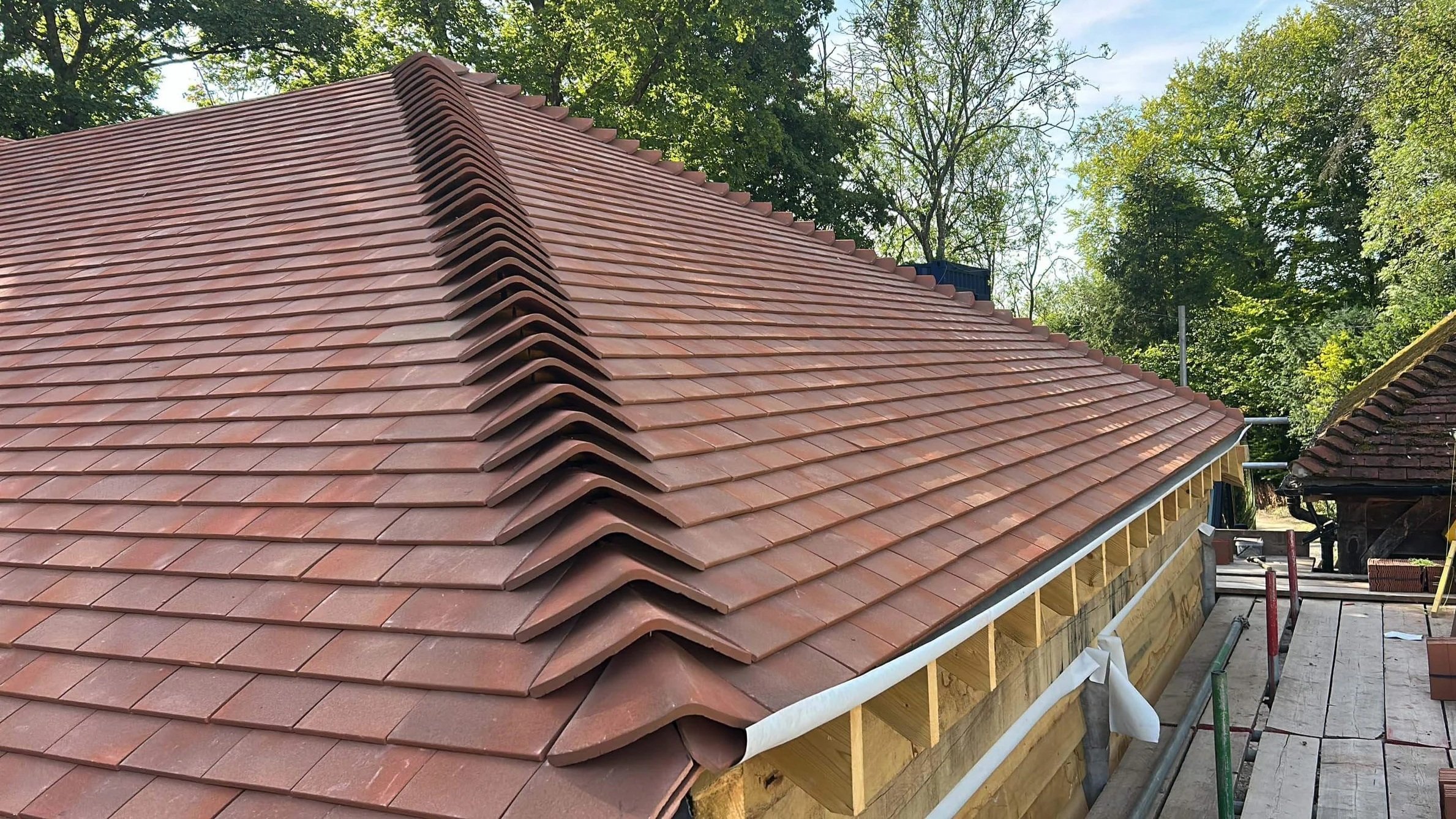 An image of a 3 bay oak garage.