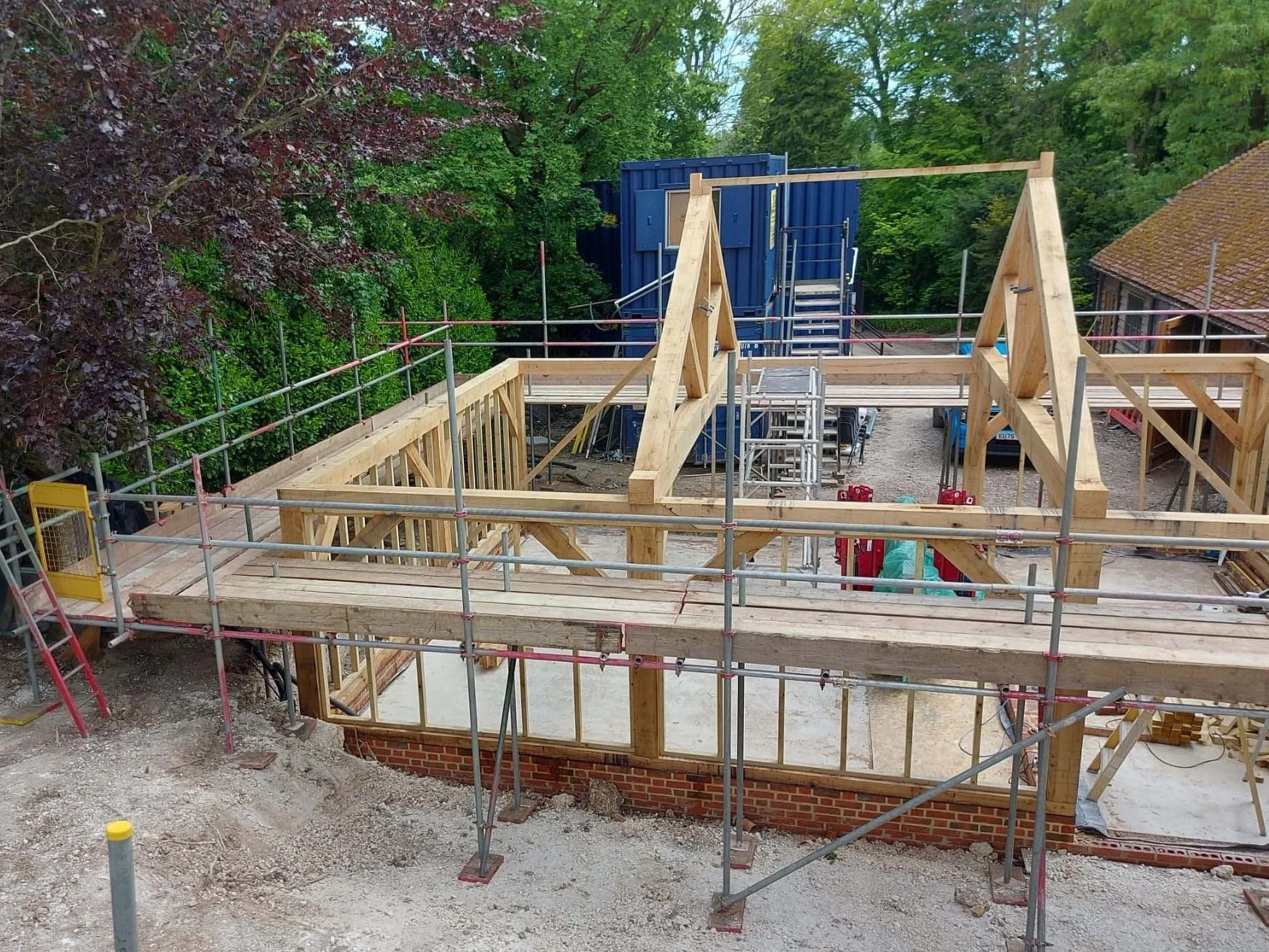 An image of a 3 bay oak garage.