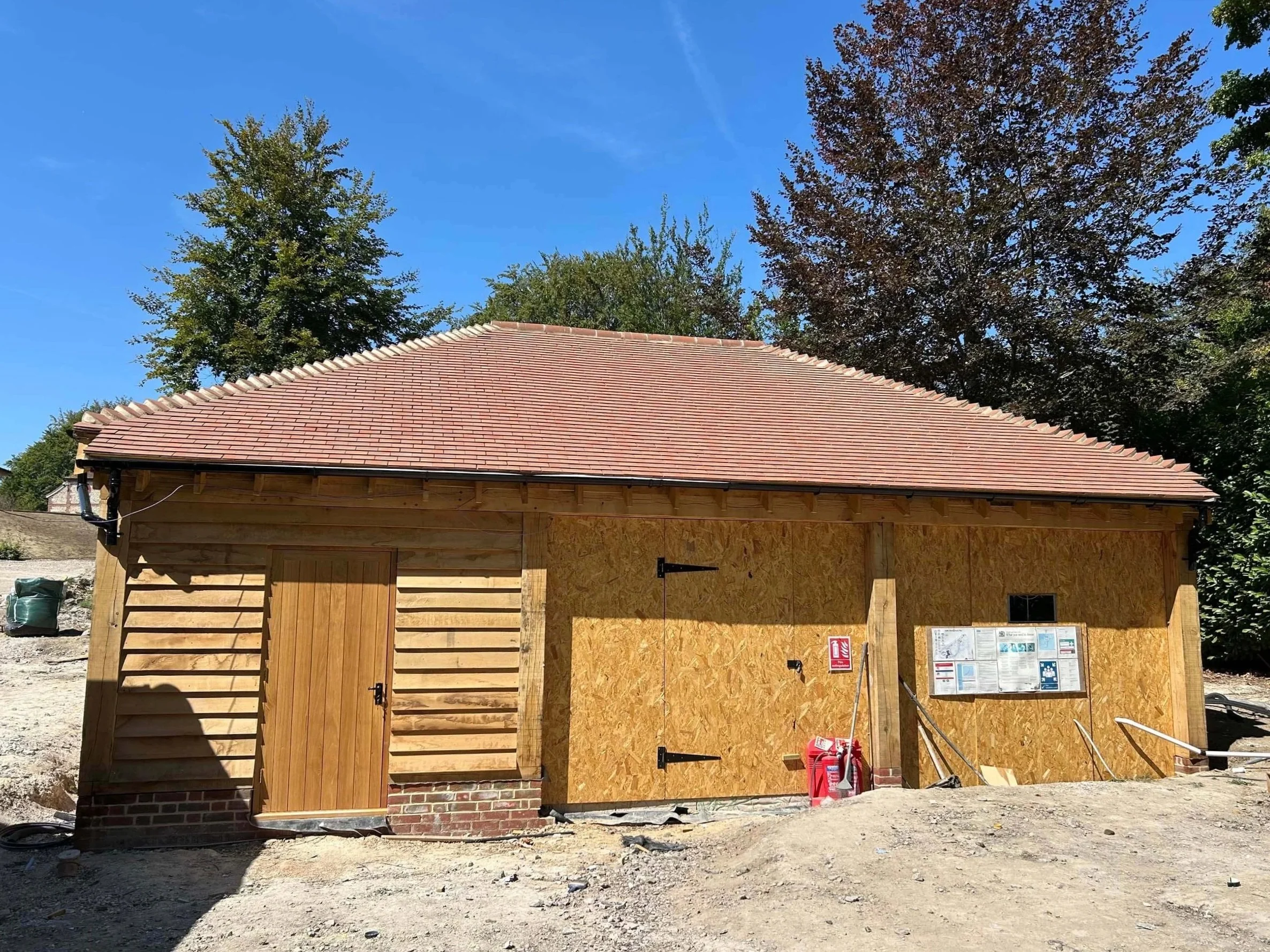 An image of a 3 bay oak garage.
