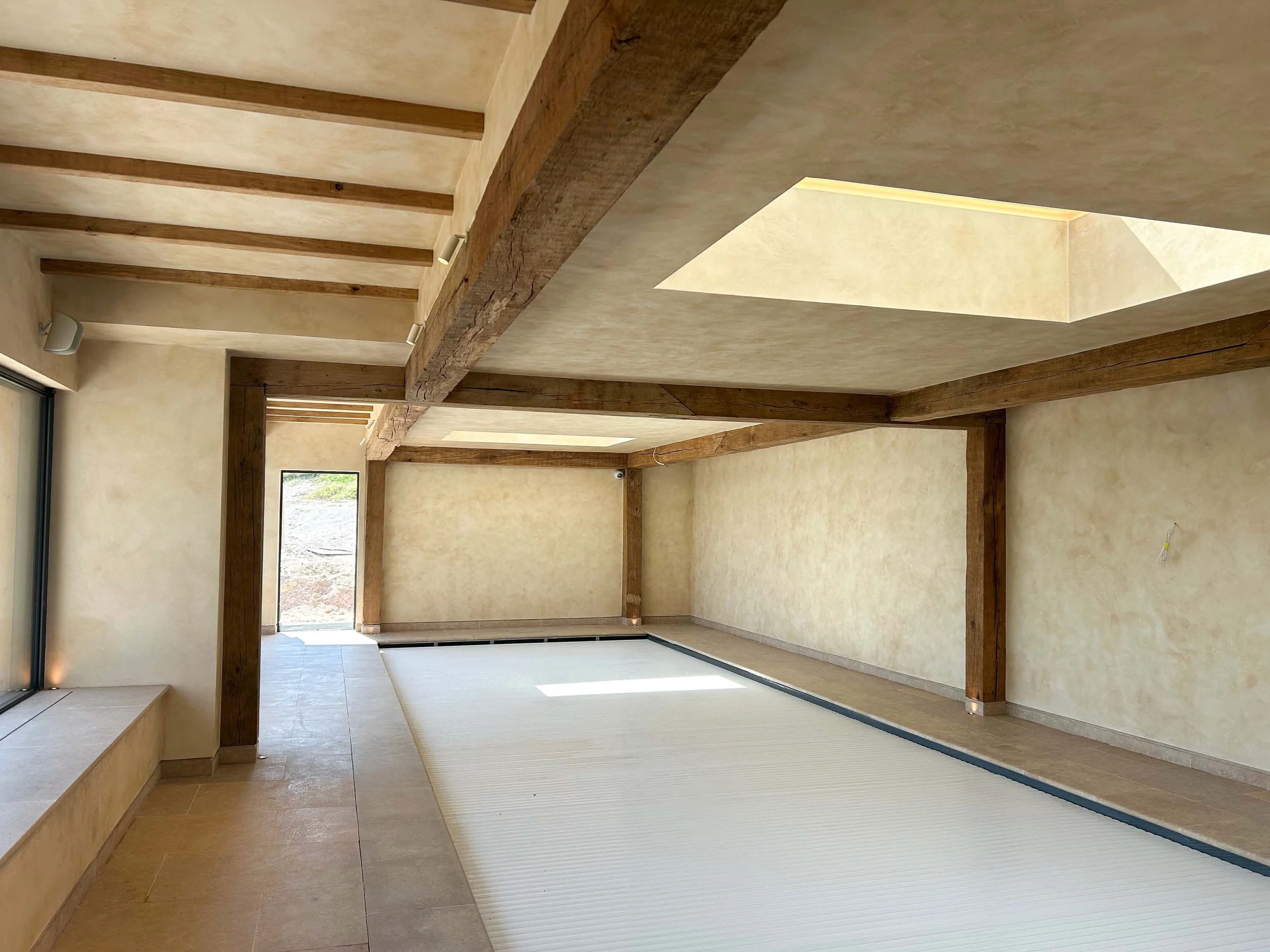 An image of an oak frame swimming pool.