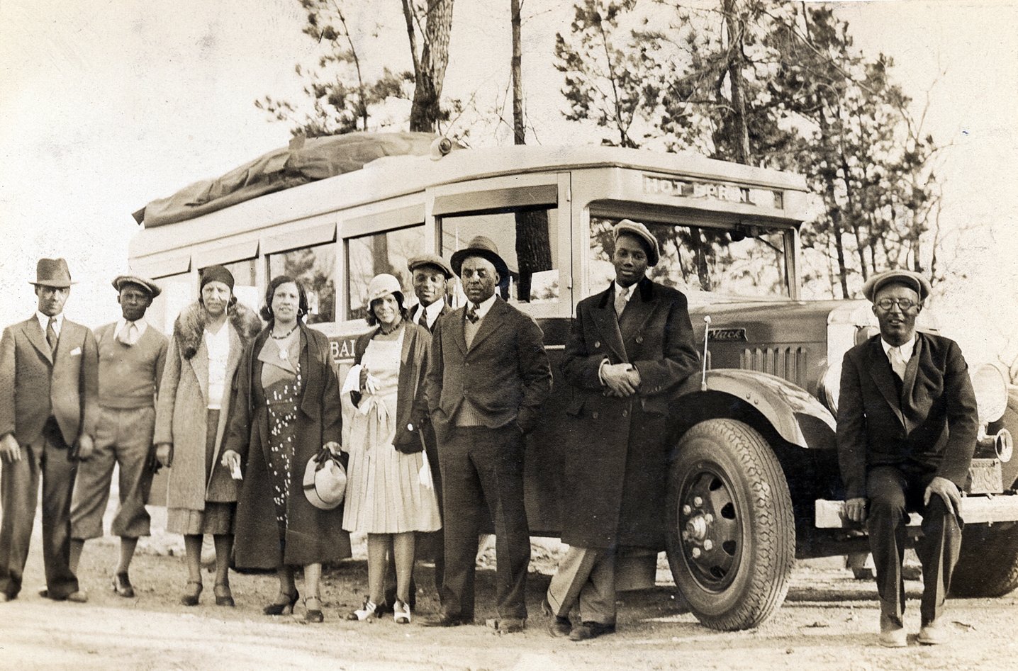 Josh Gibson and members of the Pittsburgh Crawfords posed with their team bus