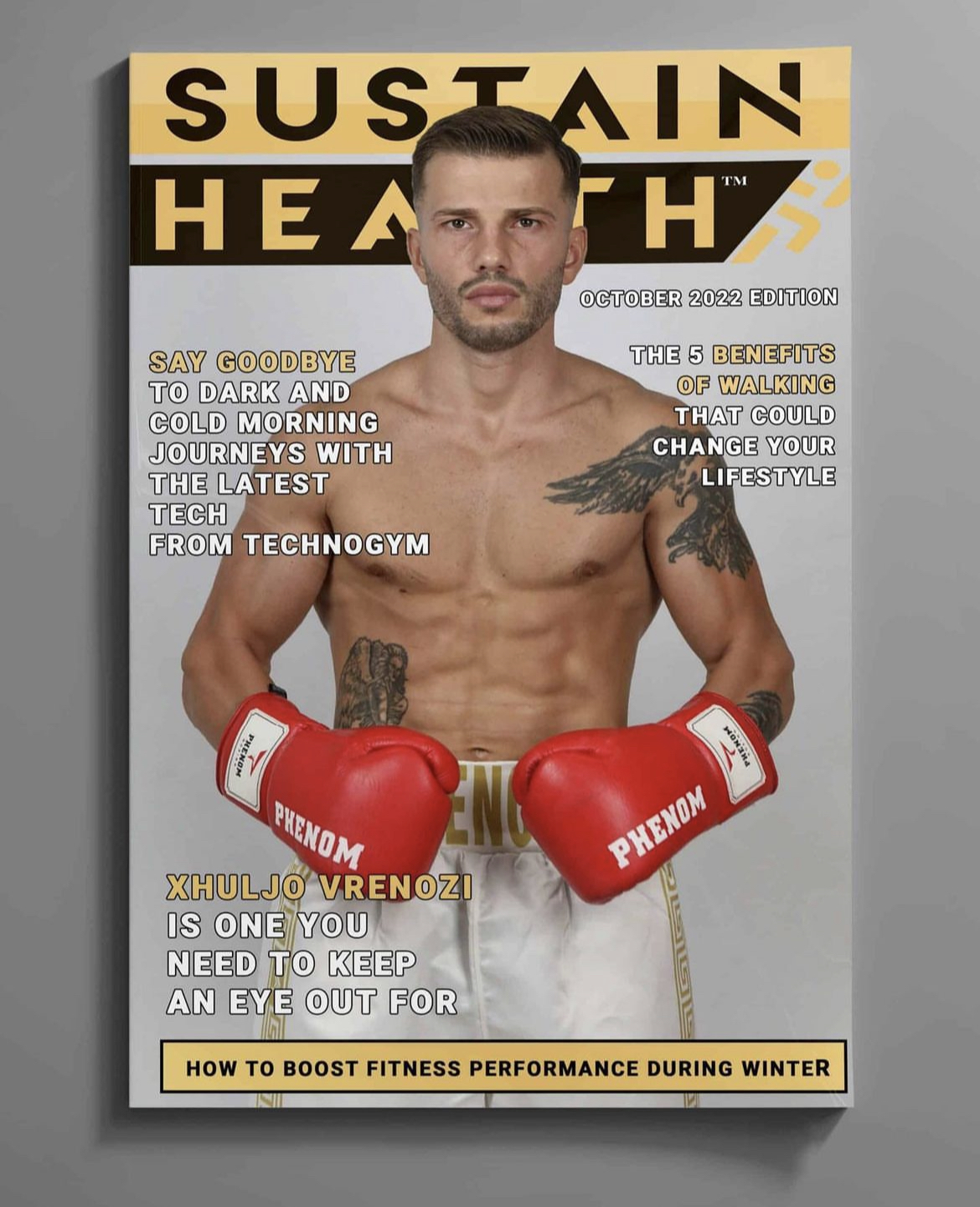 Magazine cover featuring a shirtless man with tattoos wearing red boxing gloves, with headlines about health, walking benefits, and fitness during winter.