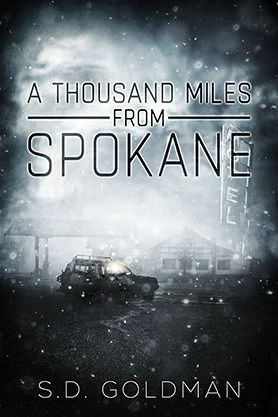 Suspense book cover for “A Thousand Miles From Spokane” by S. D. Goldman, featuring a snowy roadside motel scene with a lone car at night.