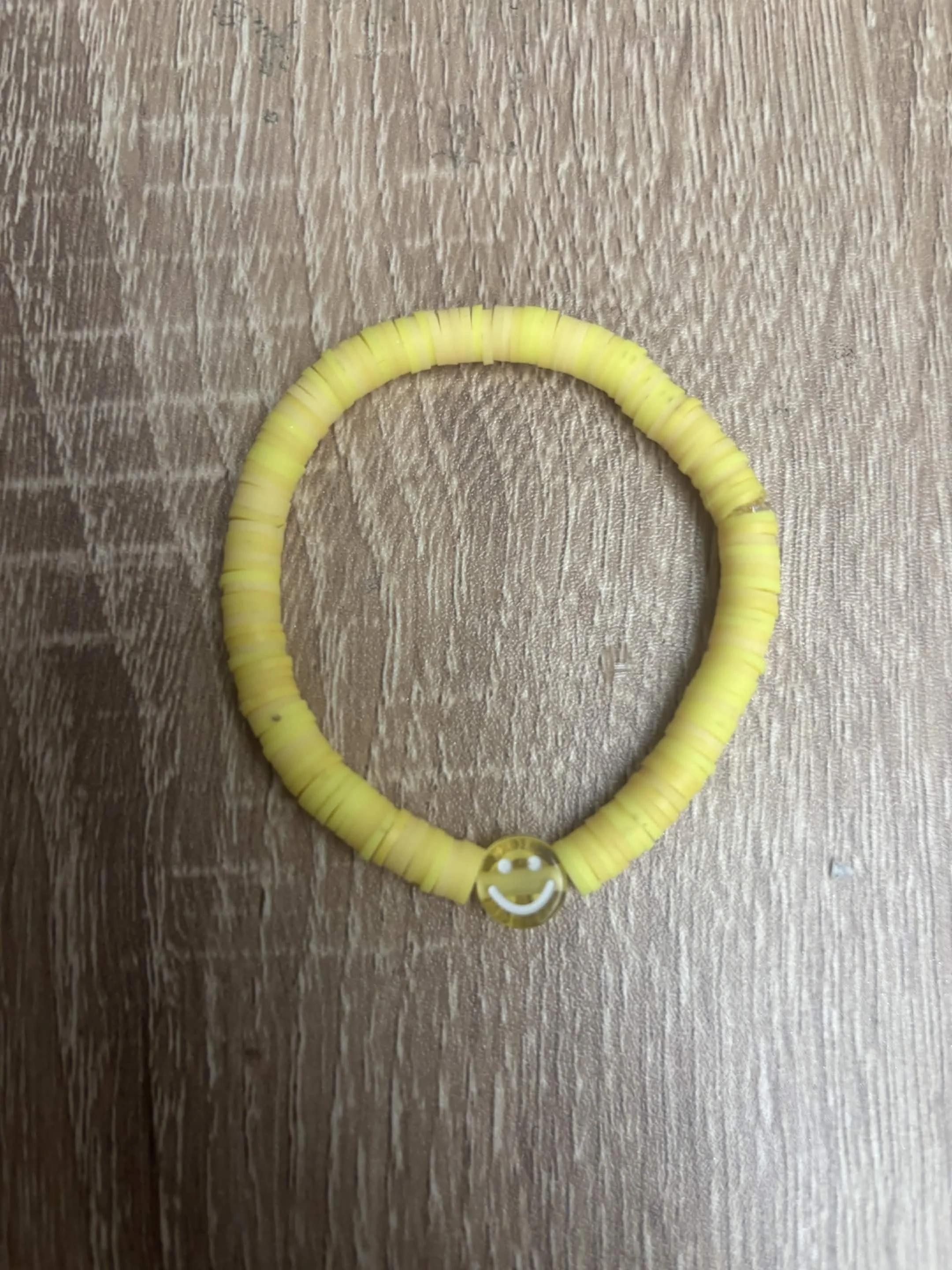 yellow smiley face bracelet