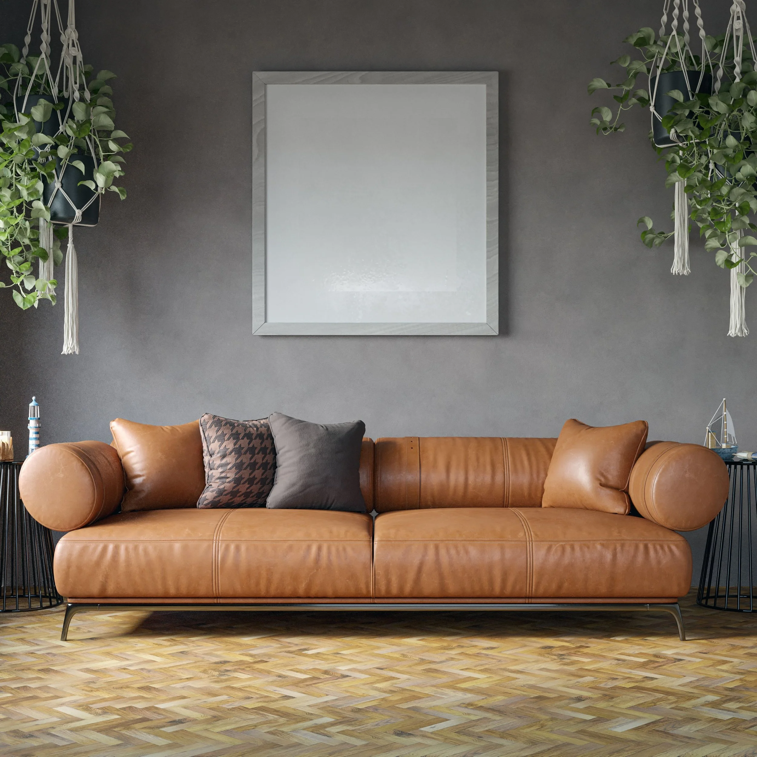 Brown leather sofa in a contemporary interior with decorative pillows and hanging greenery.