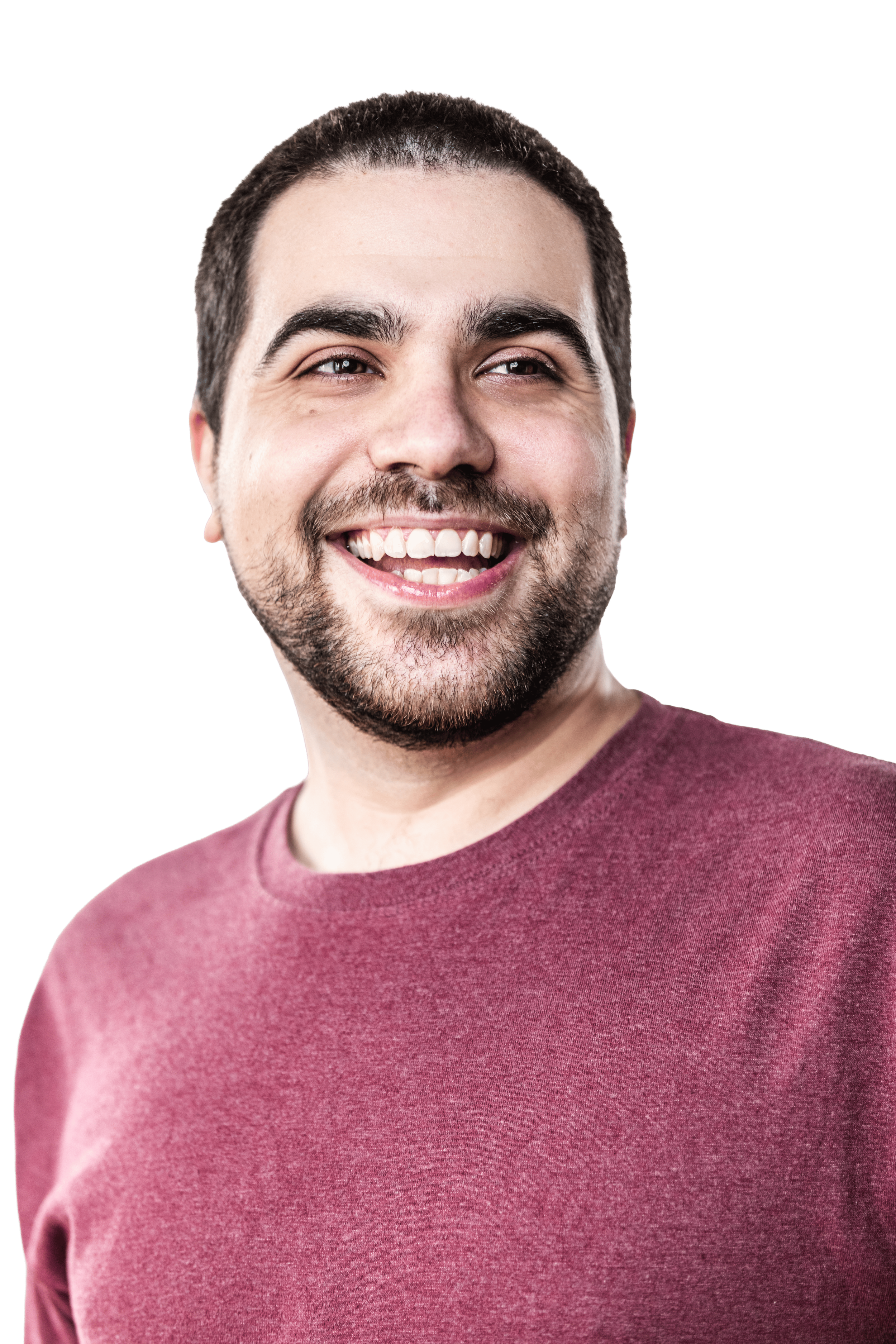 Close-up of a smiling man (Michael Pantazis) with dark hair, beard, and mustache, wearing a maroon shirt.