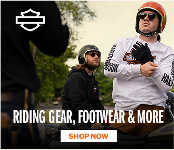 Two men wearing Harley-Davidson gear and helmets, standing next to motorcycles outdoors, advertising riding gear, footwear, and more with a 'Shop Now' button.