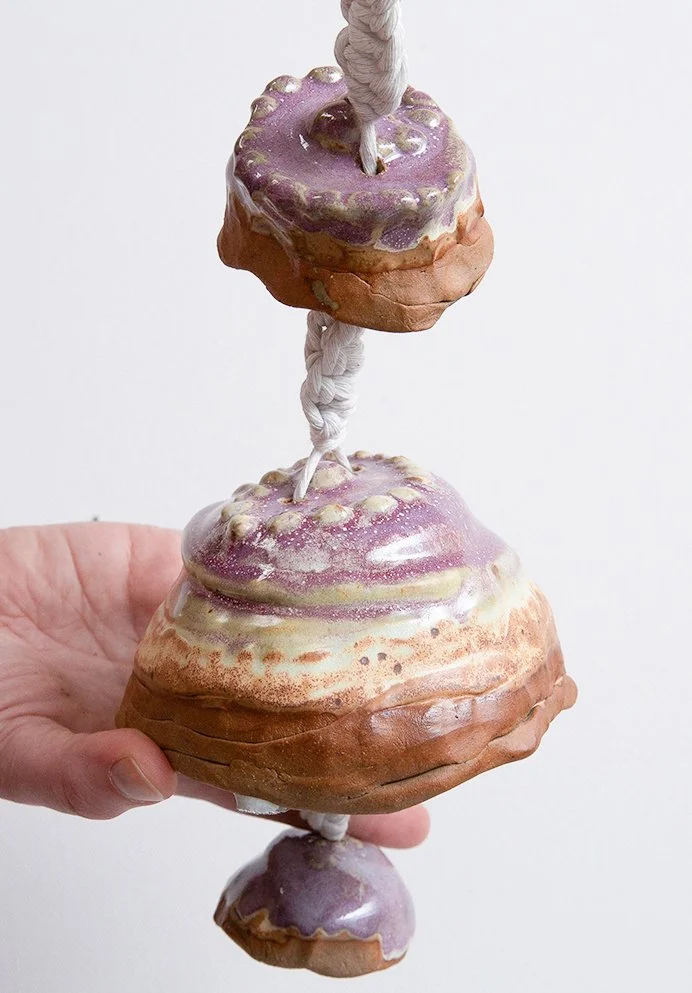 Bell Three. Molded Form.  Clay, Glaze, Macrame Cord. 2024. Deanna Varble.