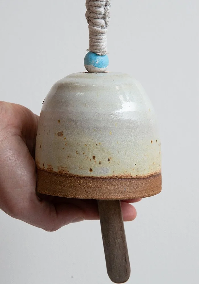 Bell One. Thrown. Clay, Glaze, Macrame Cord, Carved Wood. 2024. Deanna Varble.
