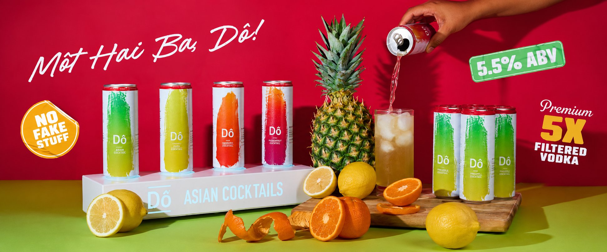 Displays Do Asian Cocktails in cans with floating fruit, pineapple, lemons, and oranges on a colorful background, with promotional text about vodka and drink ingredients.