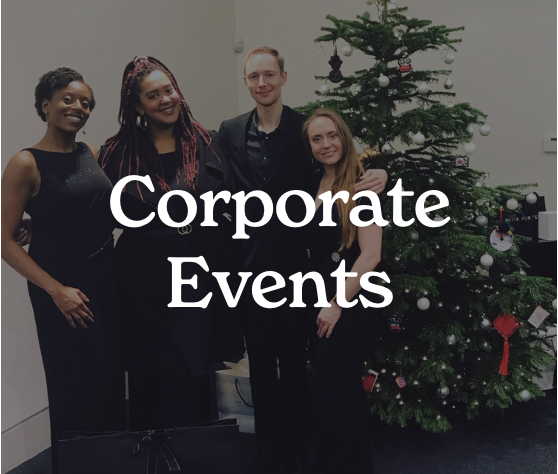 Four people standing in front of a decorated Christmas tree, smiling, with the text 'Corporate Events' overlayed.
