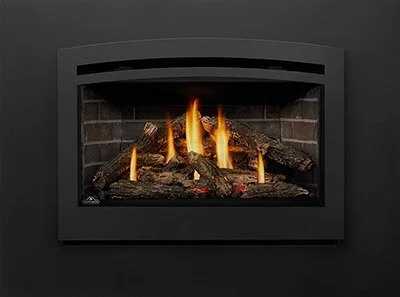 Gas fireplace with burning logs and flames. Gas insert. Fireplace insert.