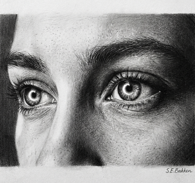 Close-up of a realistic pencil drawing of a person's eyes and eyebrows, with detailed shading and texture.