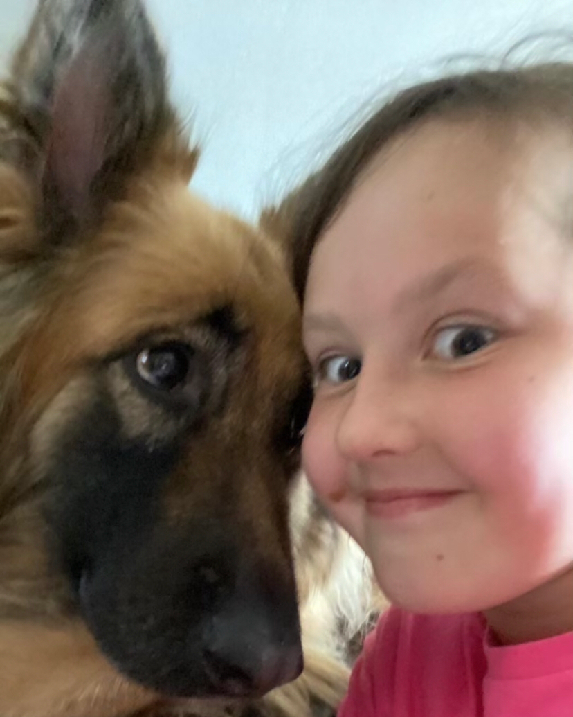 Akeela-with-granddaughter.png