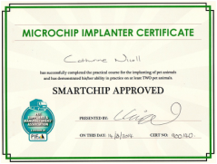 Microchip Implantation Certificate indicating approval for a Smartchip, issued to an individual with the presenter's signature and certification number.