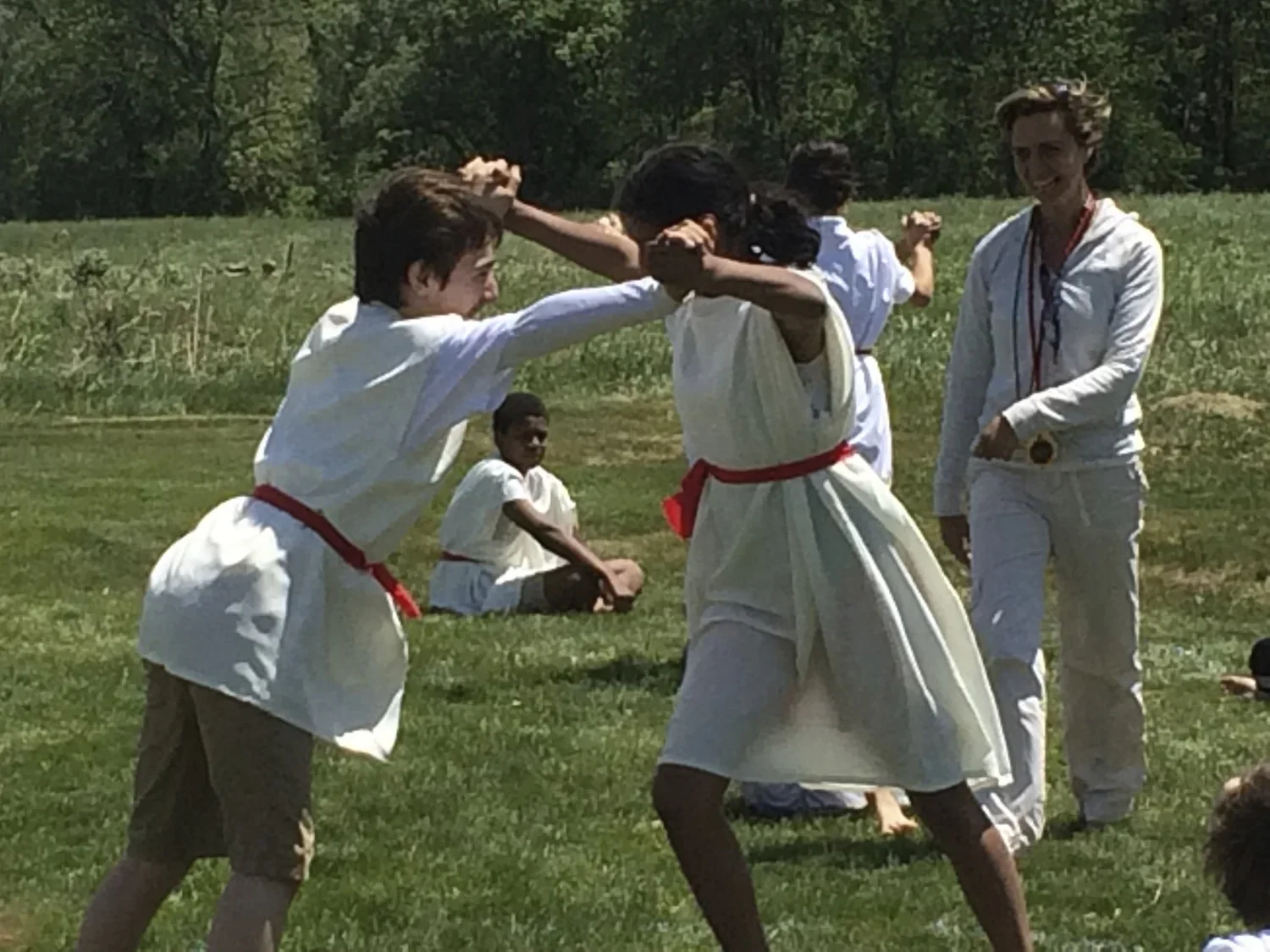 Weaving the Maypole with his friend Giancarlo