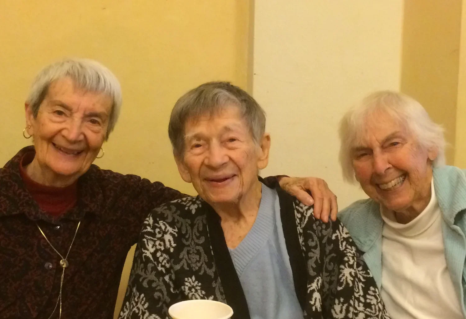  Doris, center, with friends at the Fellowship Community