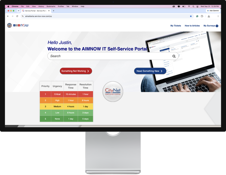 AIMNow ServiceNow portal displayed on a desktop monitor