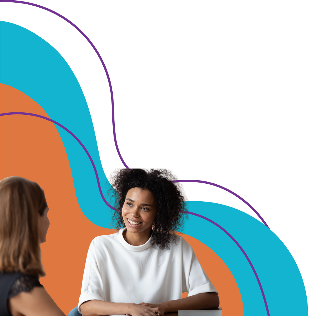 Two women having a conversation with a colorful abstract background.