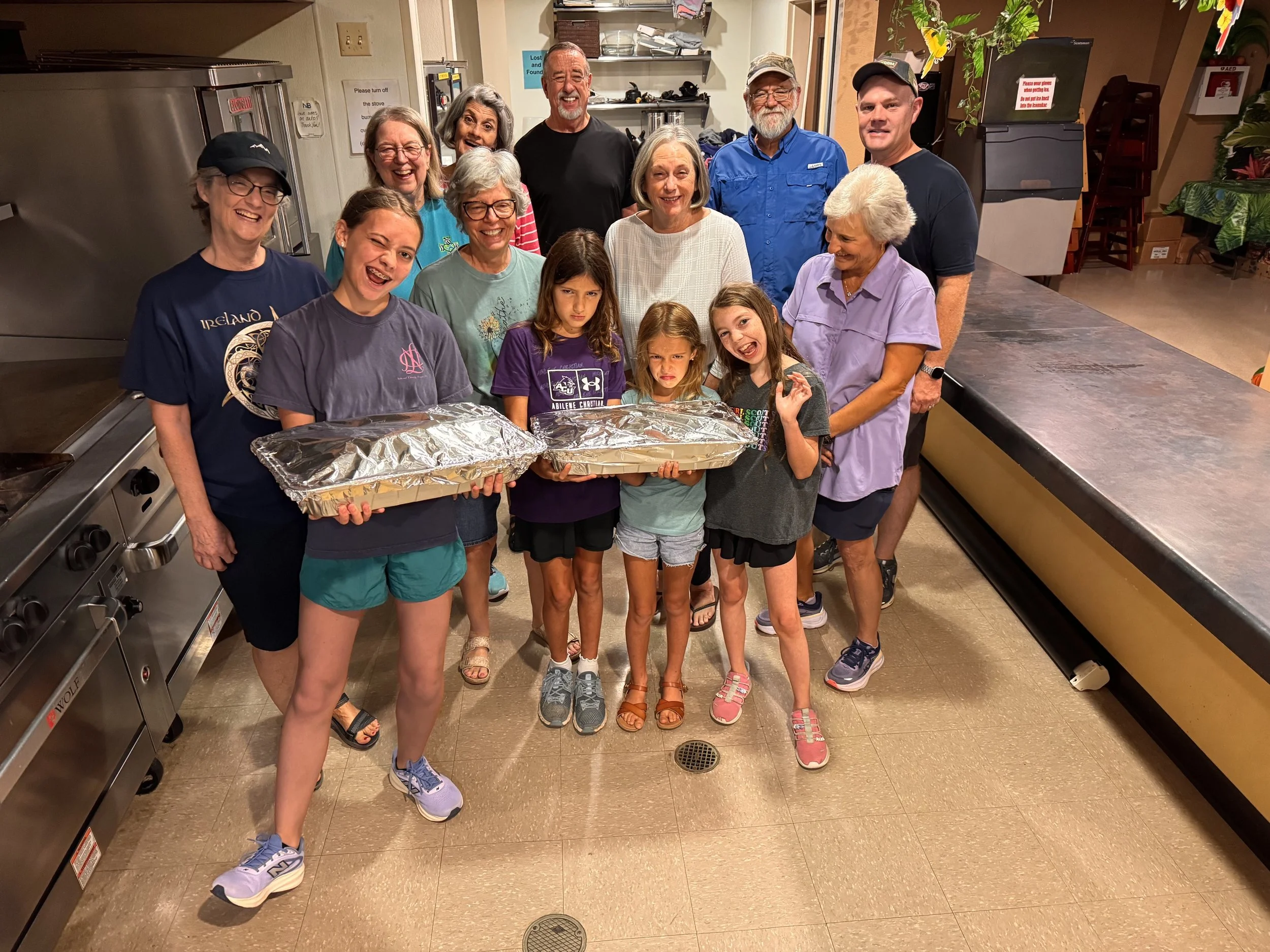 NBCOC volunteers preparing breakfast tacos for First Footing guests.