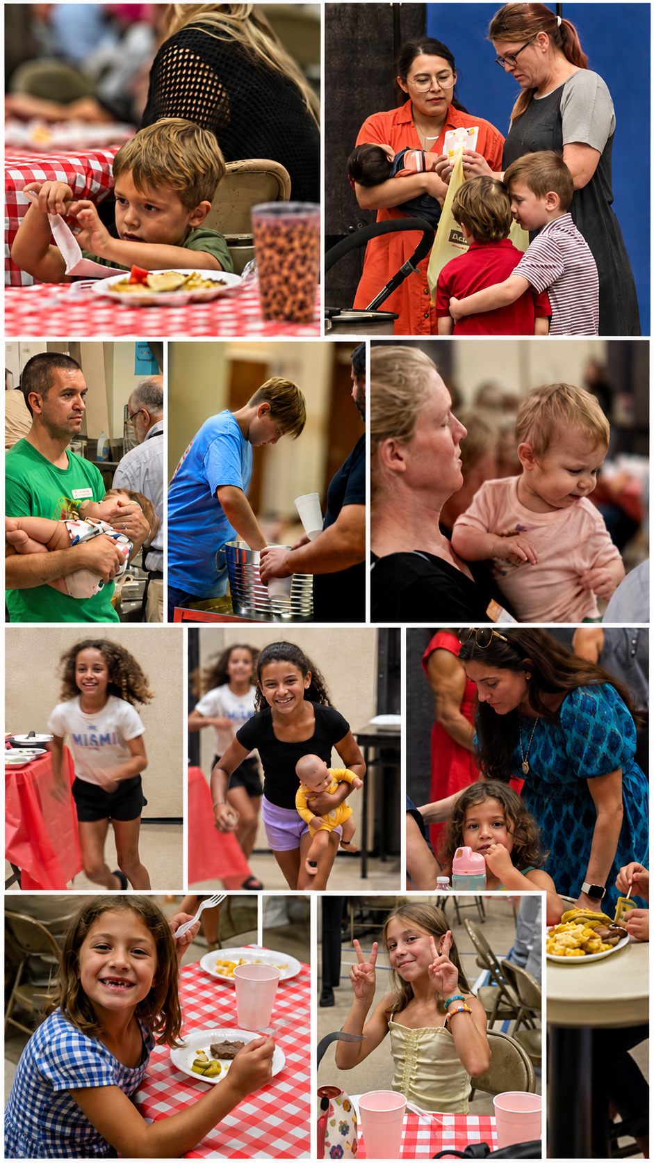 Group of children and adults at a community gathering, some eating, playing, and interacting in a social setting with tables and chairs.