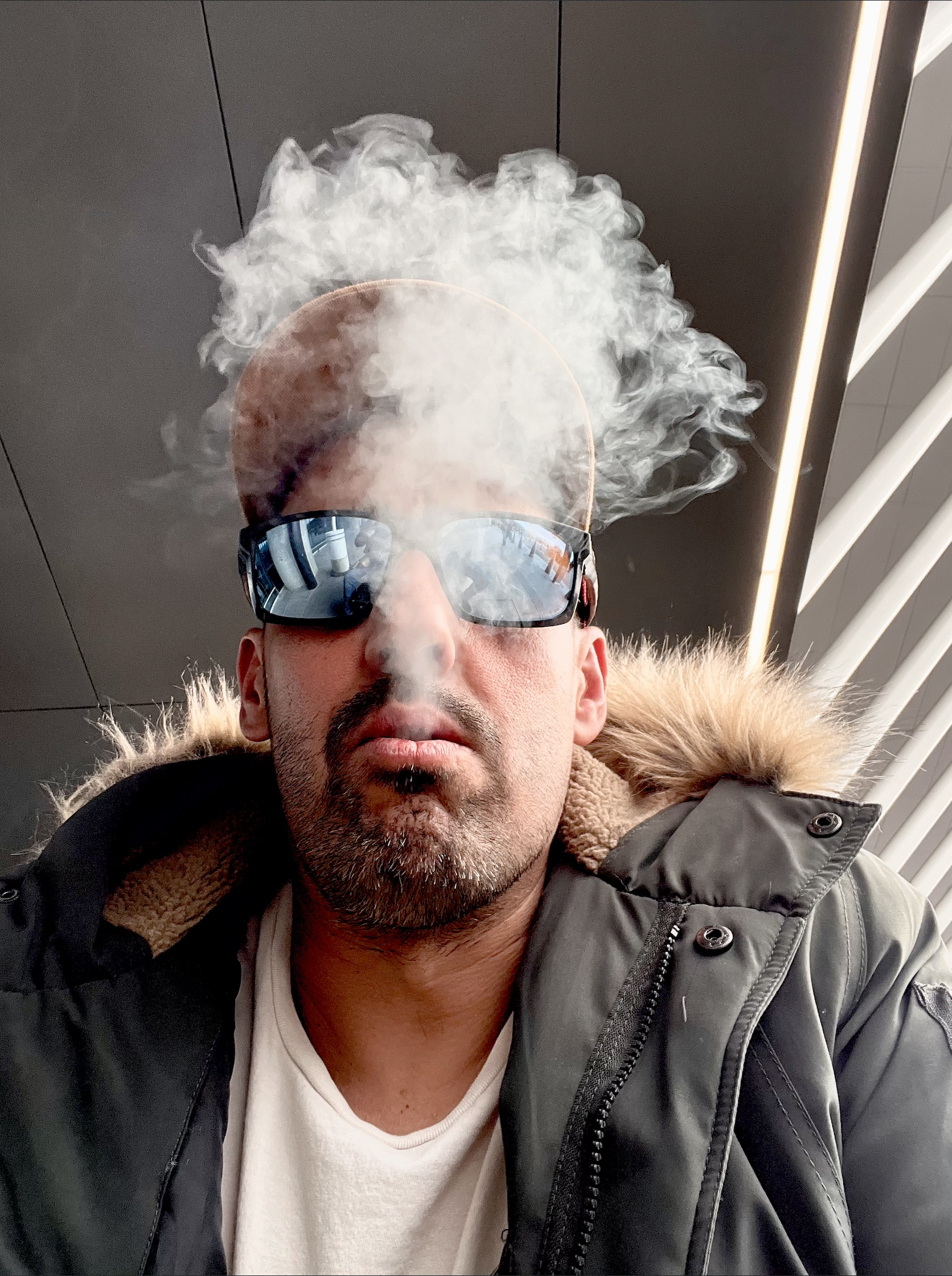 Anibal Blasutti - Product Designer smoking habano