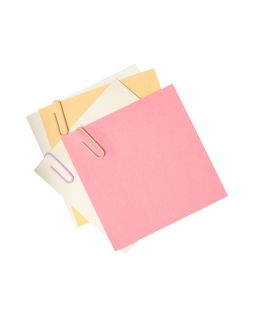 Stack of pastel-colored paper with paper clips