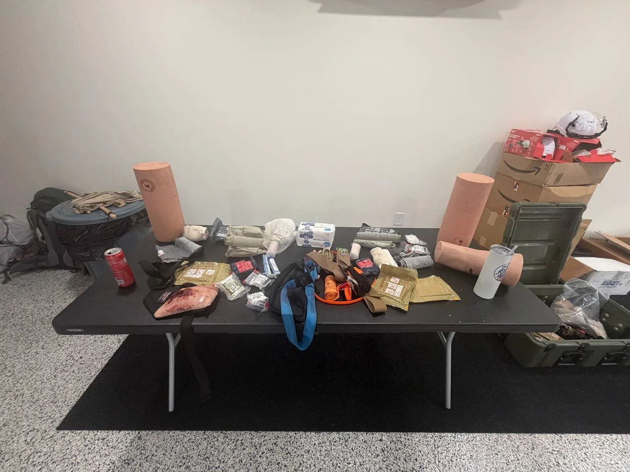First-aid and trauma-care training equipment prepared for a Kraken Combatives course.