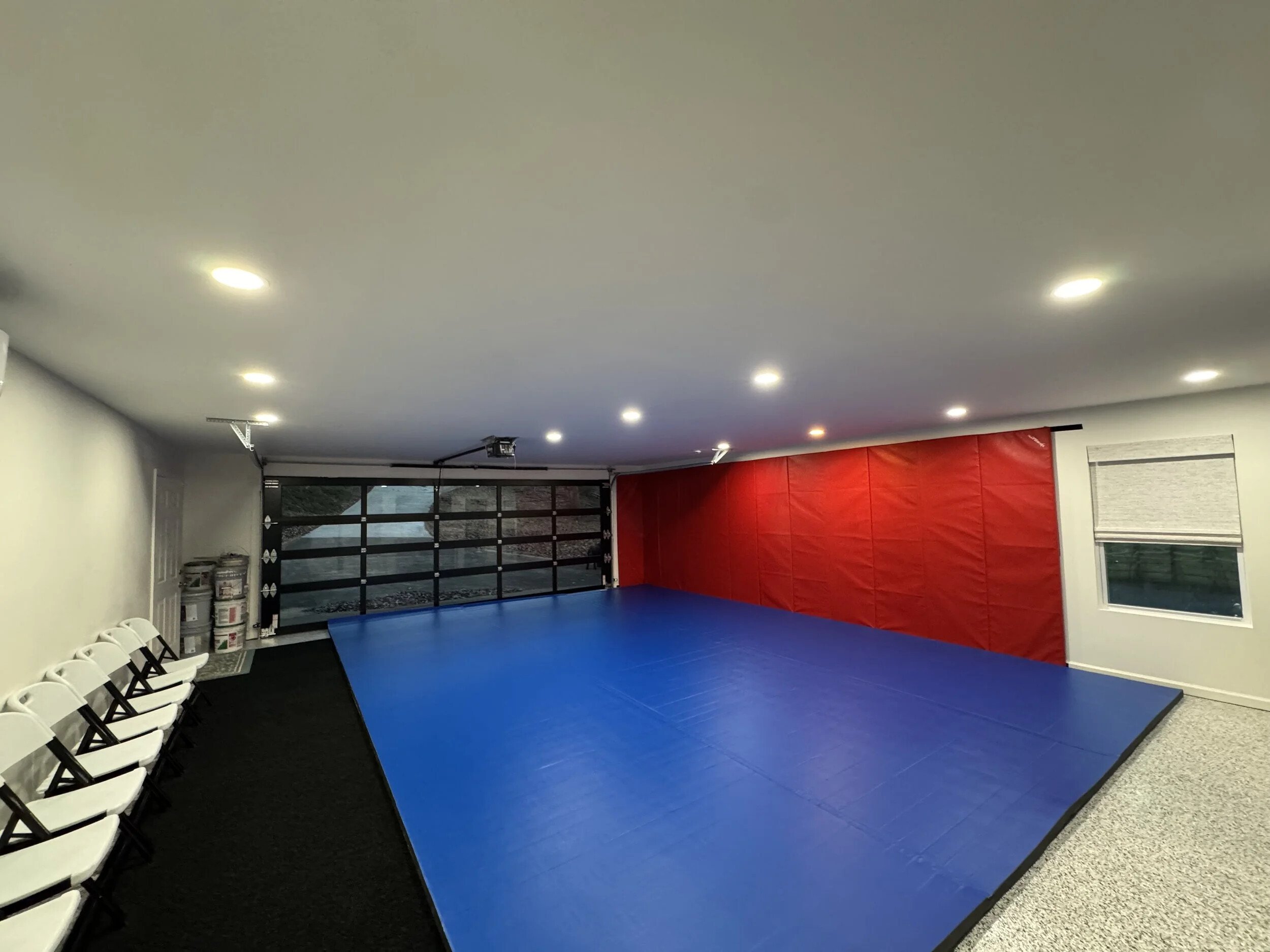 Mat Space / Classroom — Multi-purpose training area with 2-inch mats and a dedicated full bathroom.
