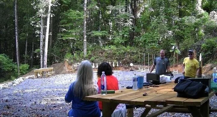Private Range — Large graveled pistol bay and rifle lane with steel targets out to 140 yards.