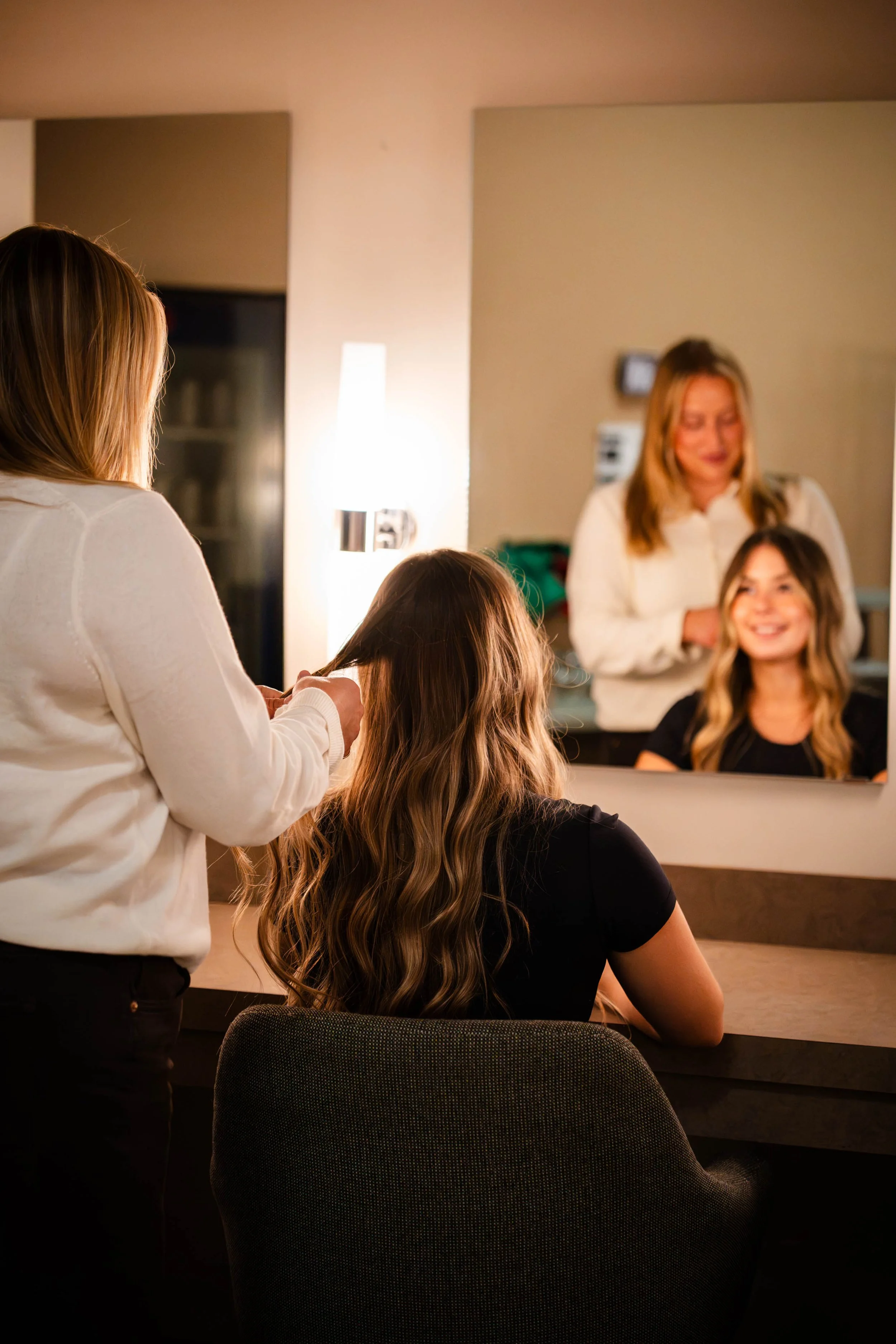 hair stylist doing a client's hair
