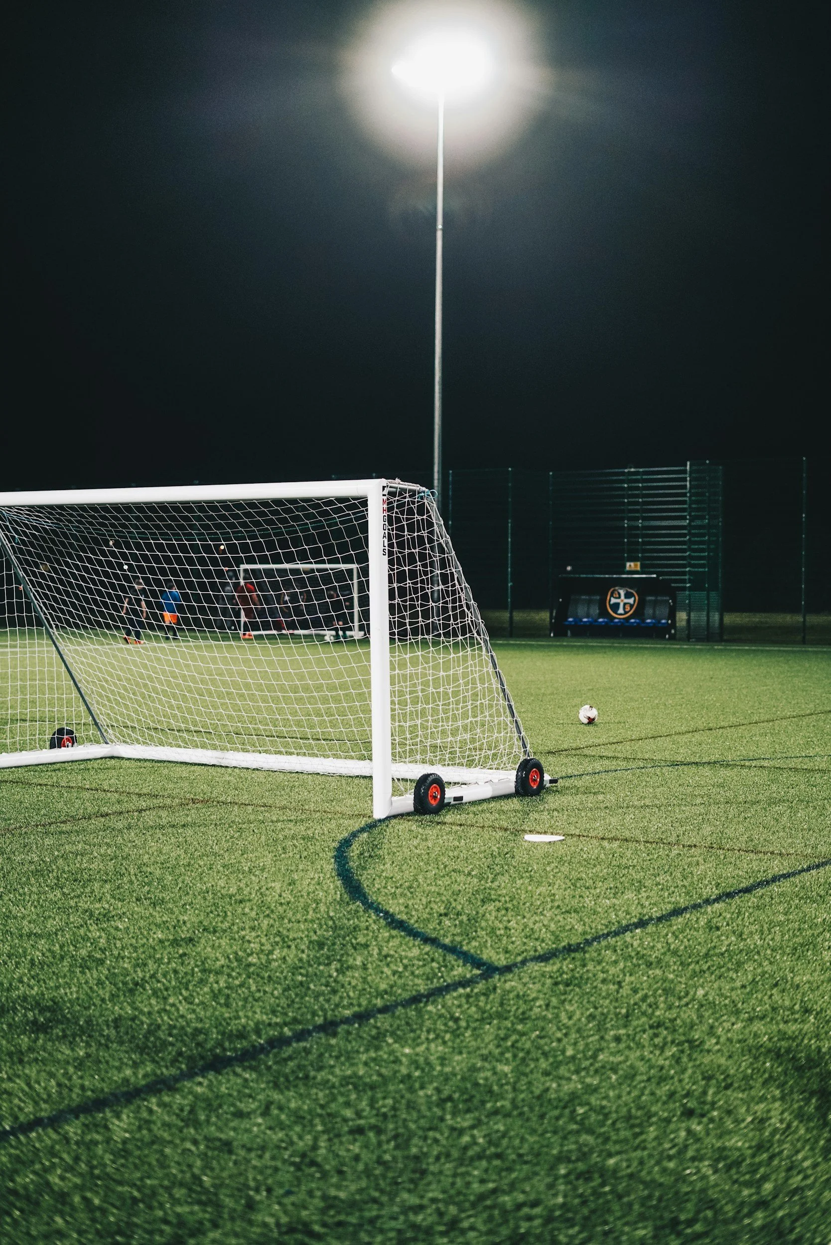 soccer nets set up outside at night