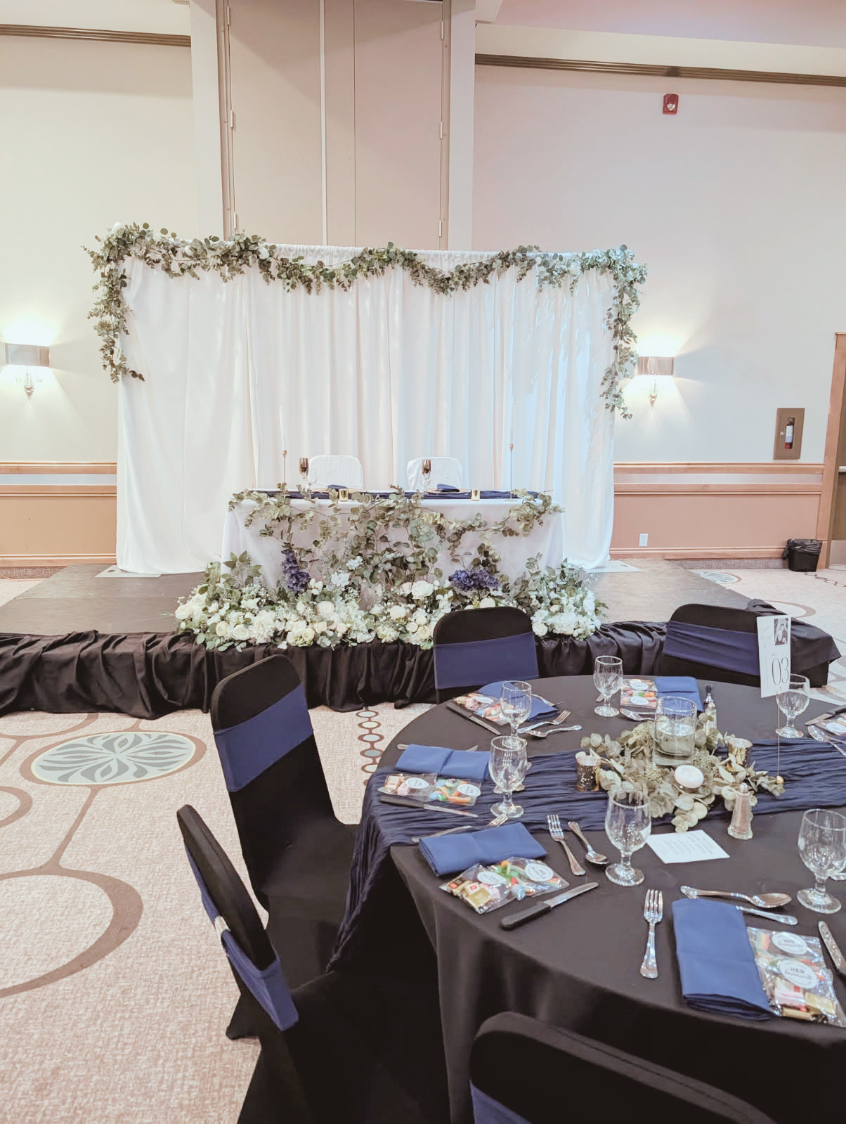 Head table for wedding reception at Denham Hospitality