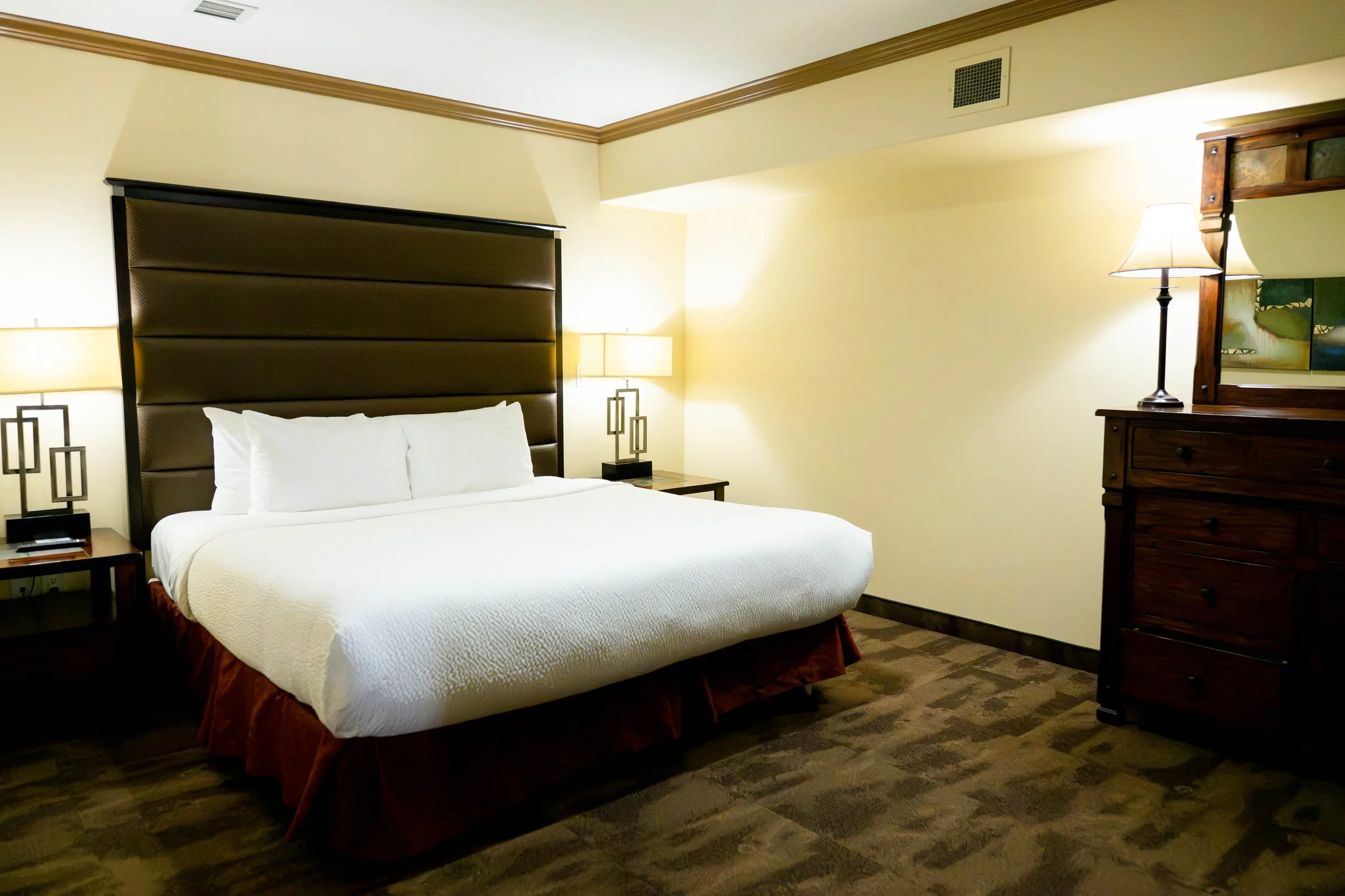 King bed in a hotel room at the Best Western Plus Rose Country Hotel