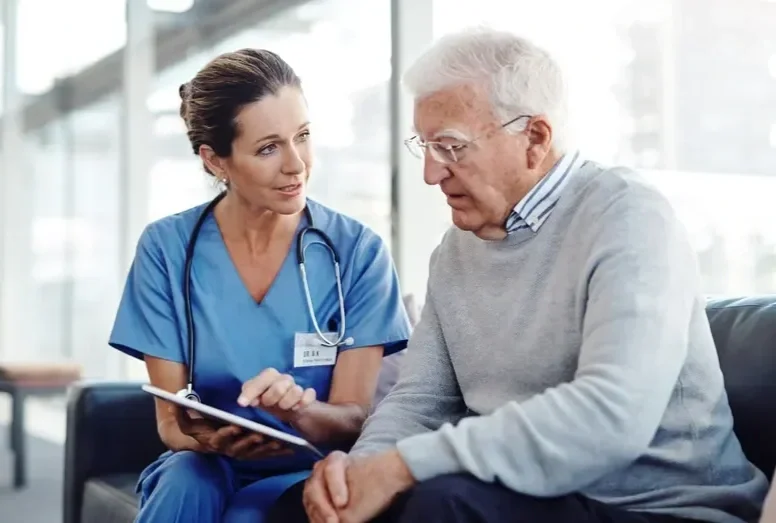 Nurse with old patient