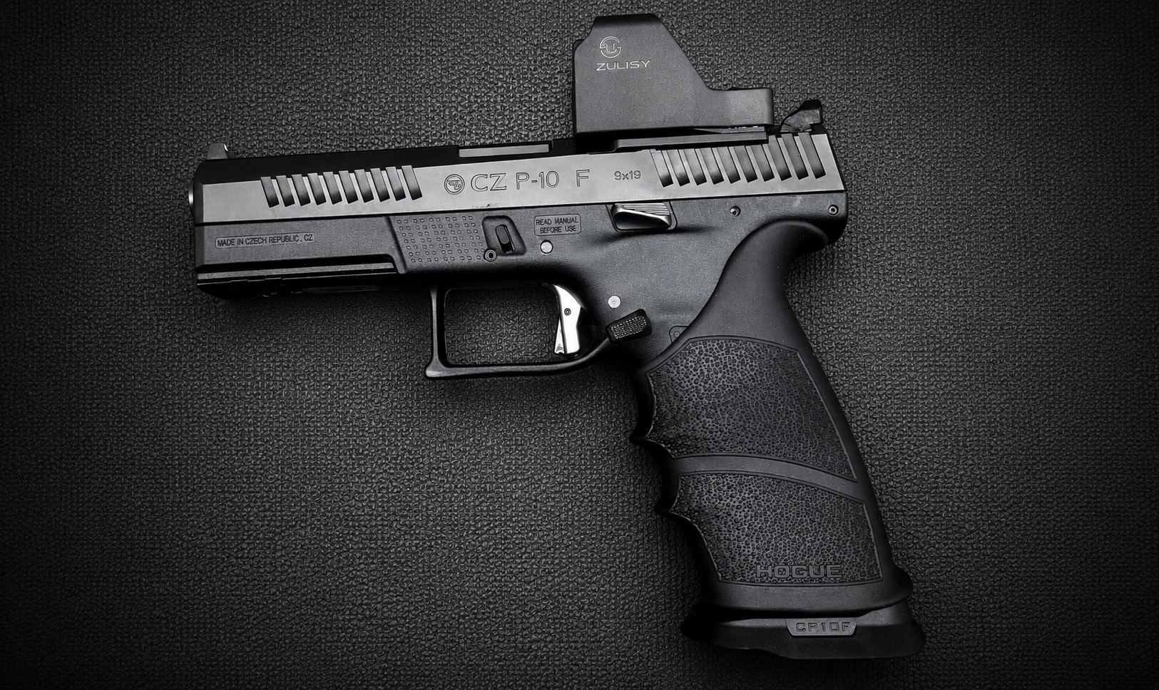 CZ P-10 F 9x19 semi-automatic pistol with ZULISY optic and Hogue grip on a black textured surface