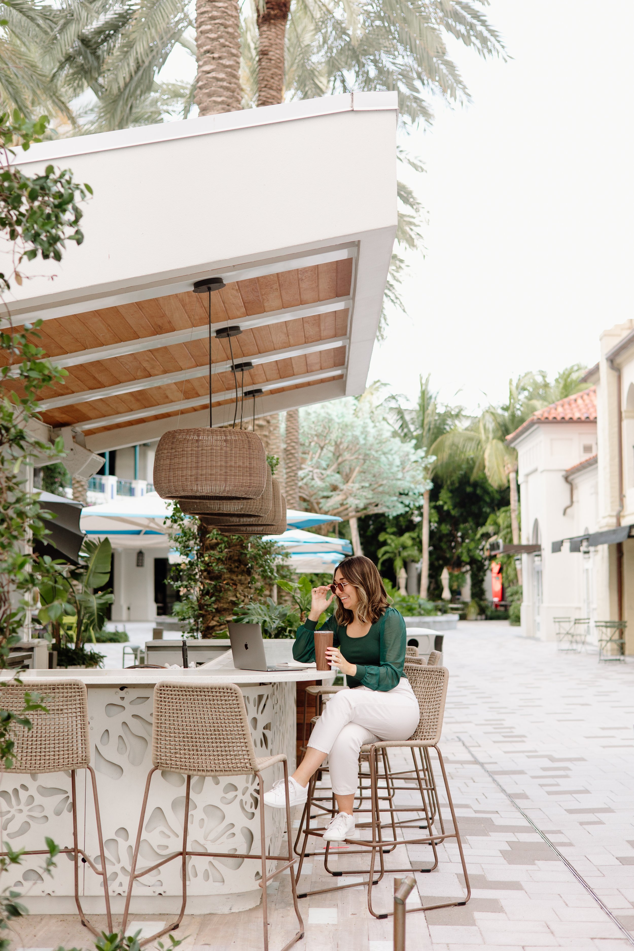 Kailyn España, counselor for moms in Florida, at an outdoor café