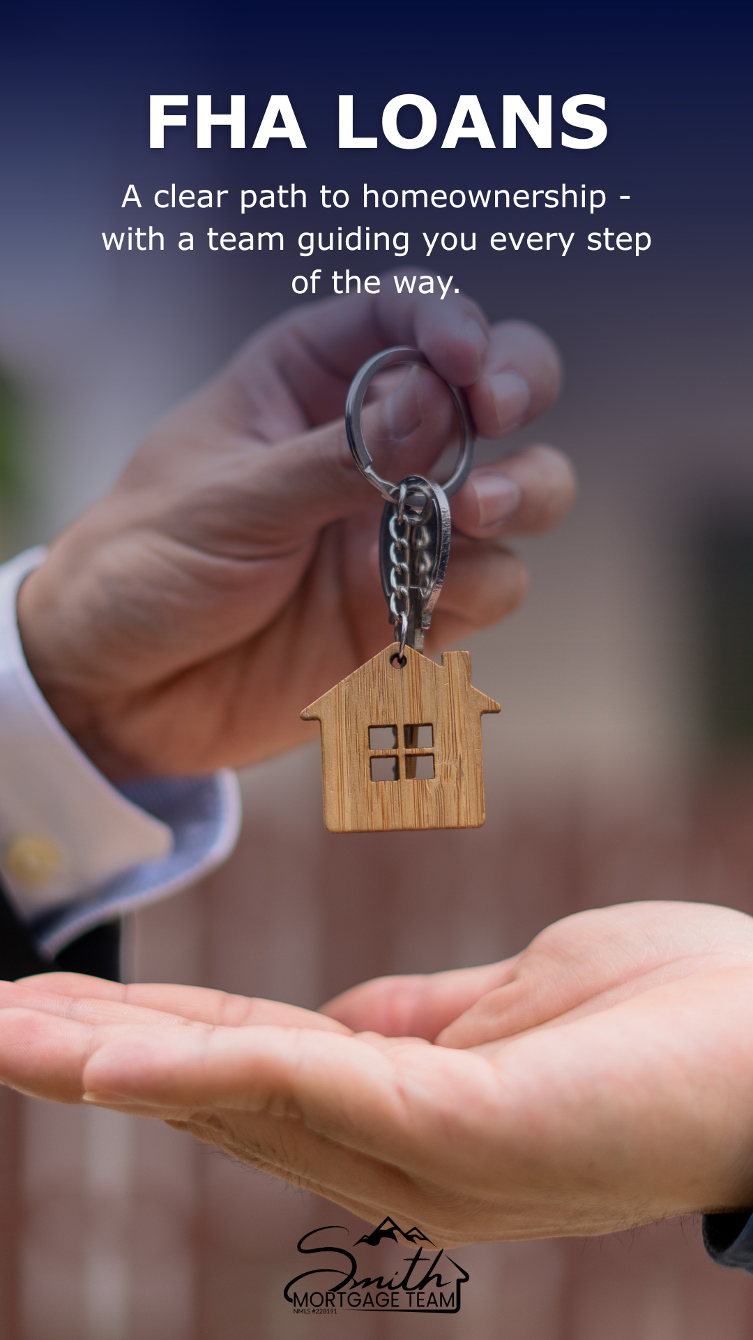 Close-up of a person handing a keychain with a wood house charm to another person. The background is blurred, and text overlay reads: 'FHA LOANS: A clear path to homeownership - with a team guiding you every step of the way.'
