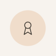 Icon of a medal or award ribbon on a beige background.