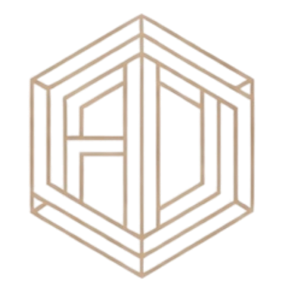 A geometric 3D cube with intricate internal patterns and a metallic appearance.
