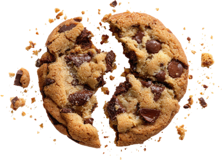 A close-up of a chocolate chip cookie broken in half with chocolate chips inside.