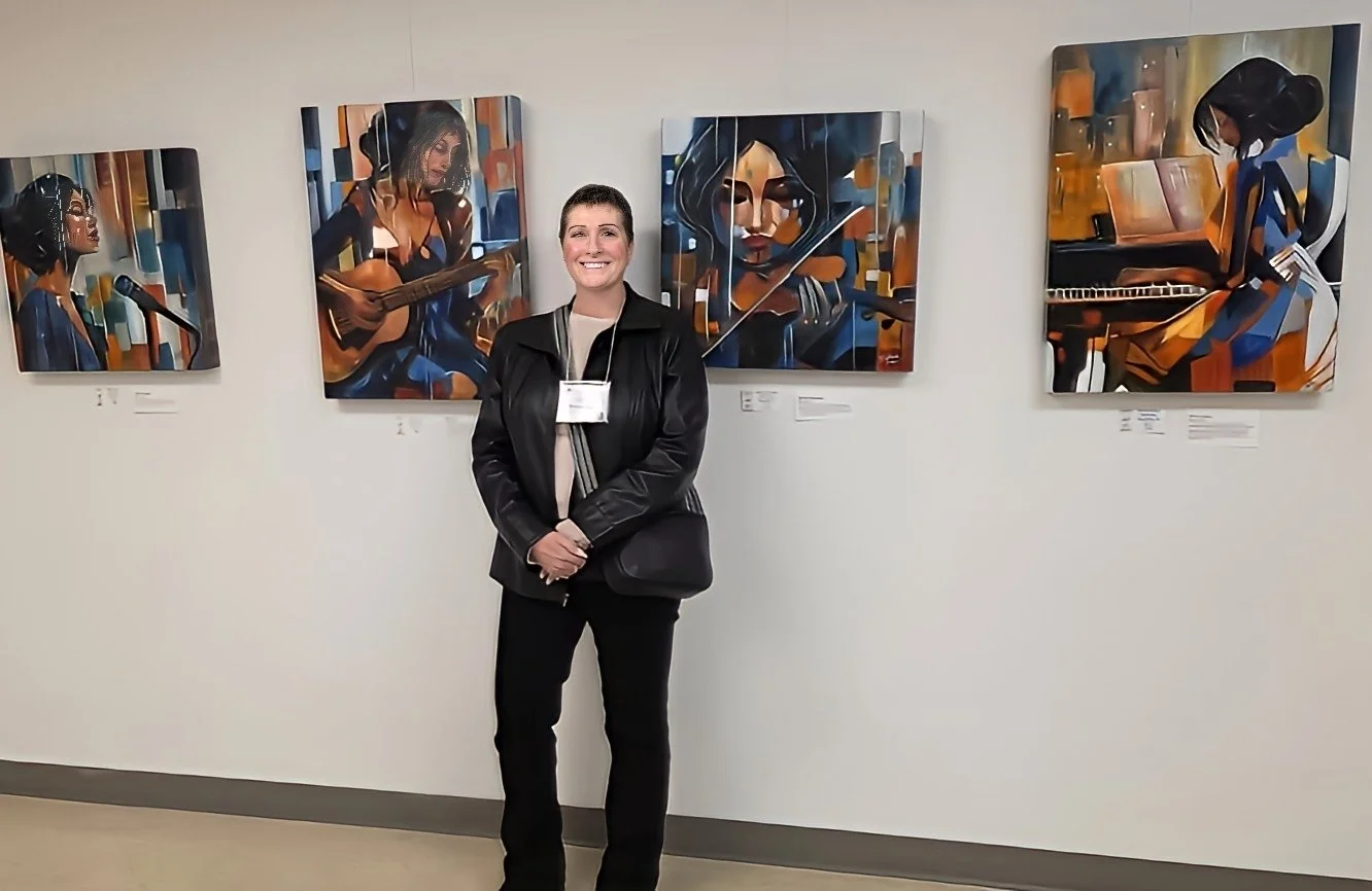 Woman with short hair, black leather jacket, and black pants standing in front of four abstract paintings of women playing musical instruments at an art gallery.