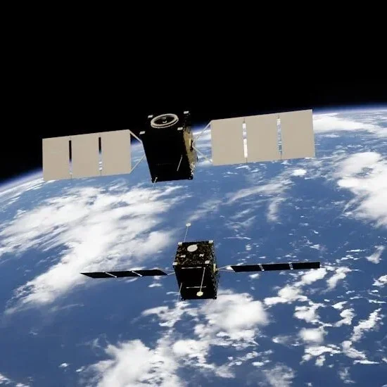 Two satellites orbiting Earth with the planet's surface visible, clouds, and space in the background.